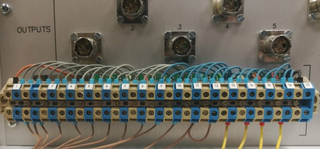 Figure 4 (original): Terminal block for the input signals, with blue (positive) and grey (negative) terminals.